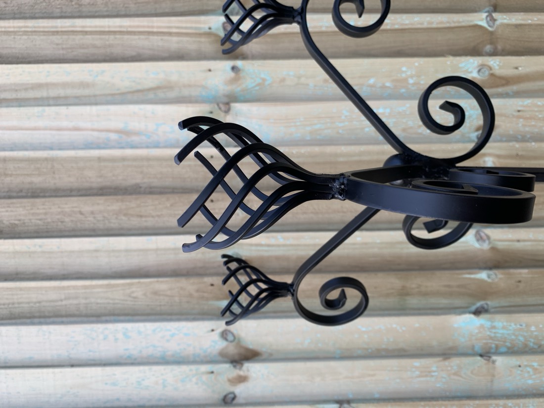 Steel bird feeder, close-up