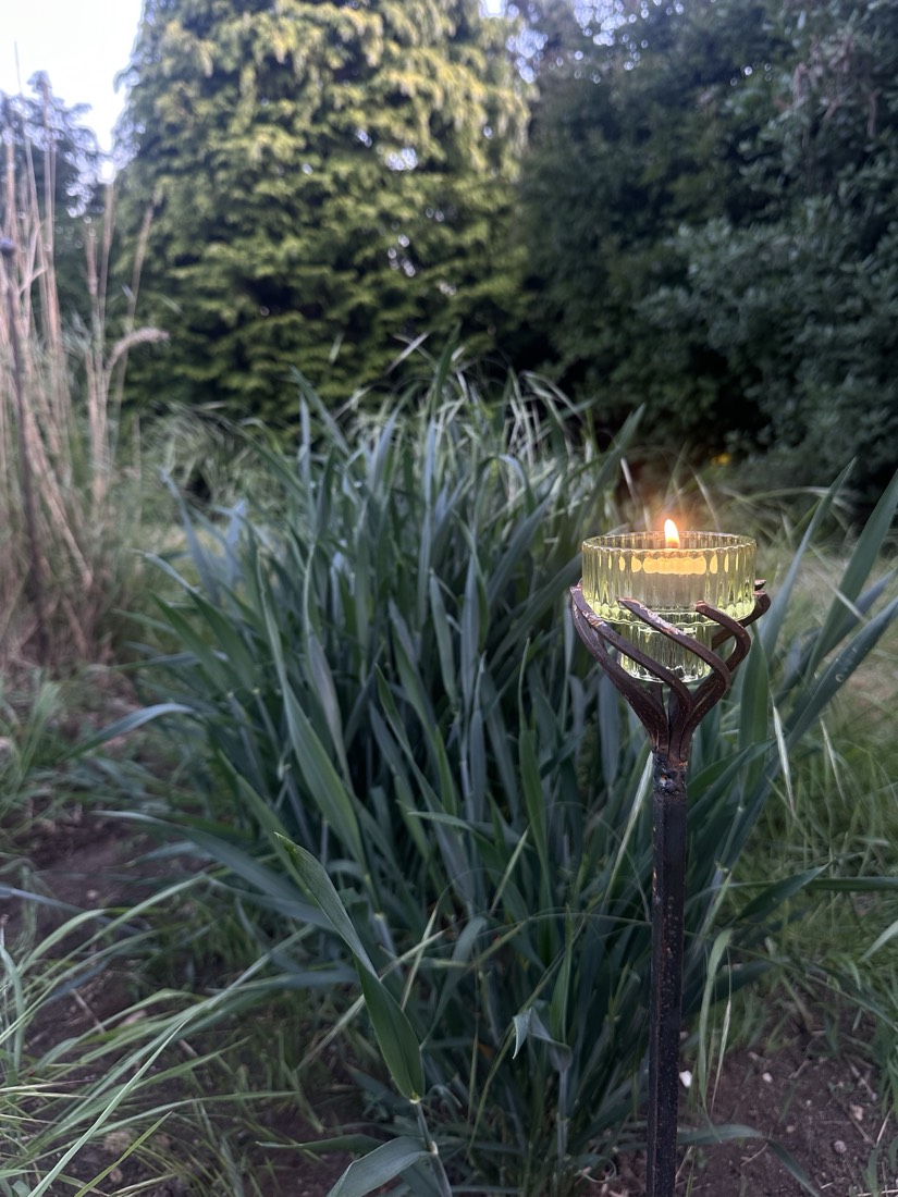 Steel candle holder with glass dish